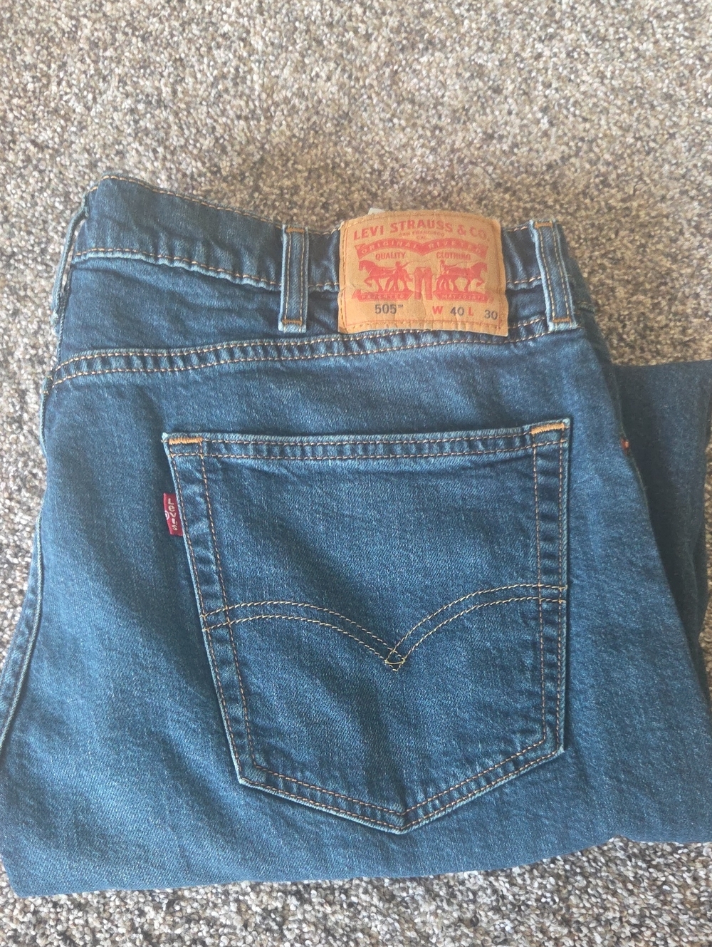 Levi's Men's Straight Jeans in Medium Blue with Tan Patch